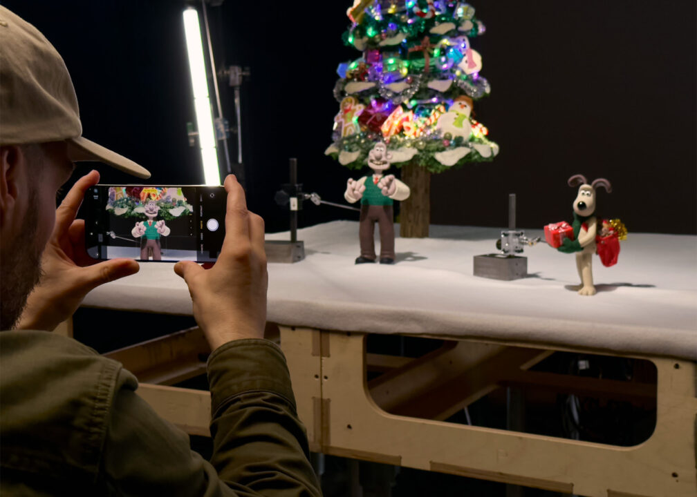 Wallace et gromit illuminent le siège d'apple pour noël